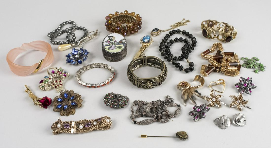 Group of Costume Jewelry: Including bead necklaces, bangle bracelet, chain necklace, pins and brooches. Notice to bidders: Due to the nature of this particular online sale, the lots offered may not be available for detailed co