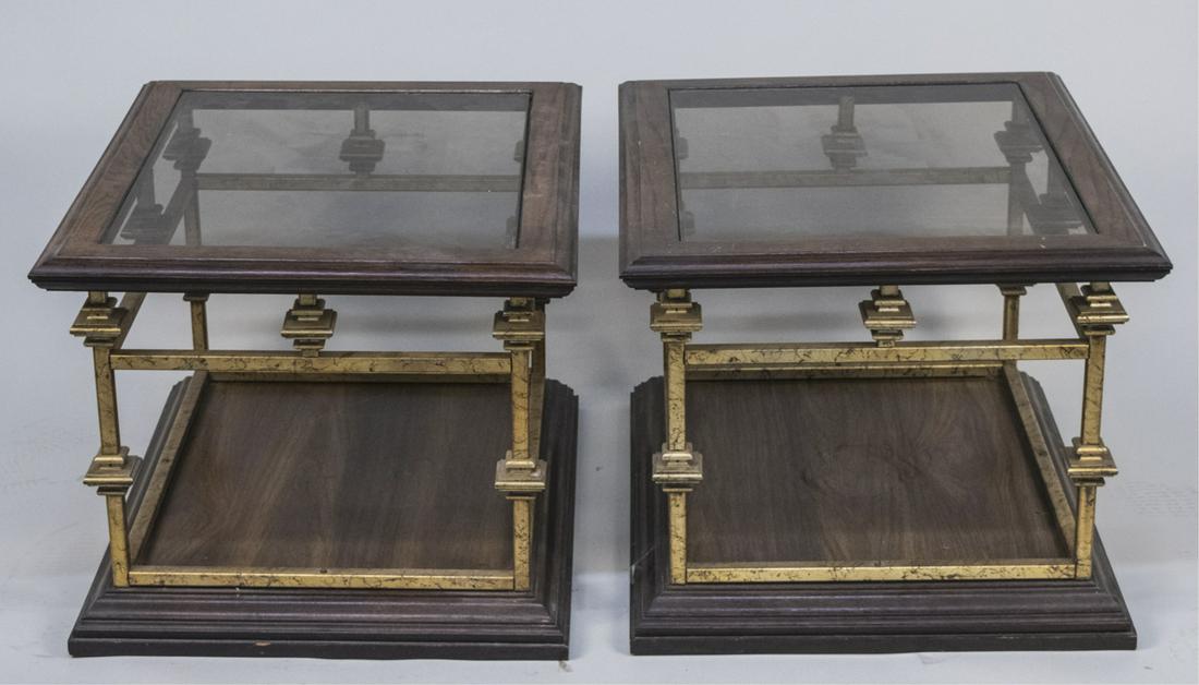 Pair of Glass Top Side Tables: Each with rectangular top with molded edge and lightly smoked glass inset, on gold painted metal frame, and conforming wood base. Height 19 inches, width 27 inches, depth 23 inches. Notice to bidders: