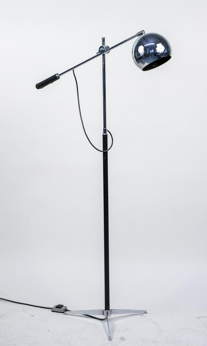 Robert Sonneman Chrome Eyeball Floor Lamp: Single light with globular form chrome shade on a boom arm, on a black leather wrapped chrome support, tripartite base. As shown, height 63 inches. Notice to bidders: Condition reports and additional