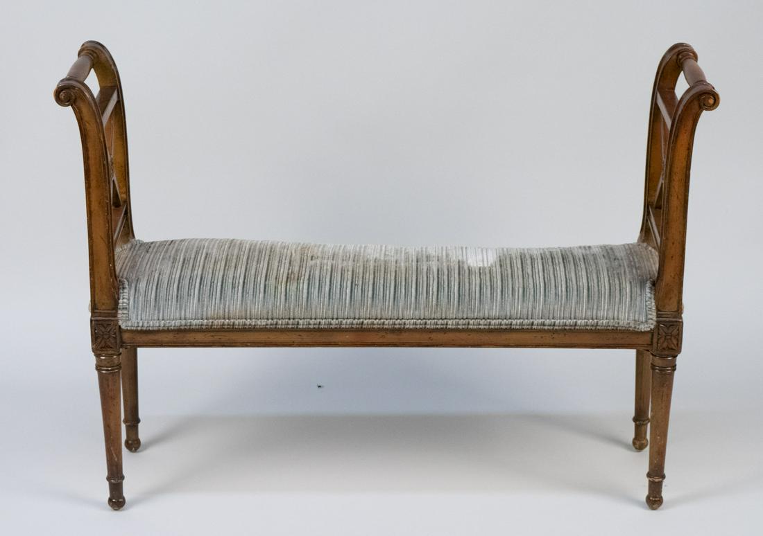 Neoclassical Style Window Bench: Upholstered seat, turned tapered legs. Height 28 inches, width 38 inches, depth 10 inches. Notice to bidders: Condition reports and additional photographs are provided by request as a courtesy to our 