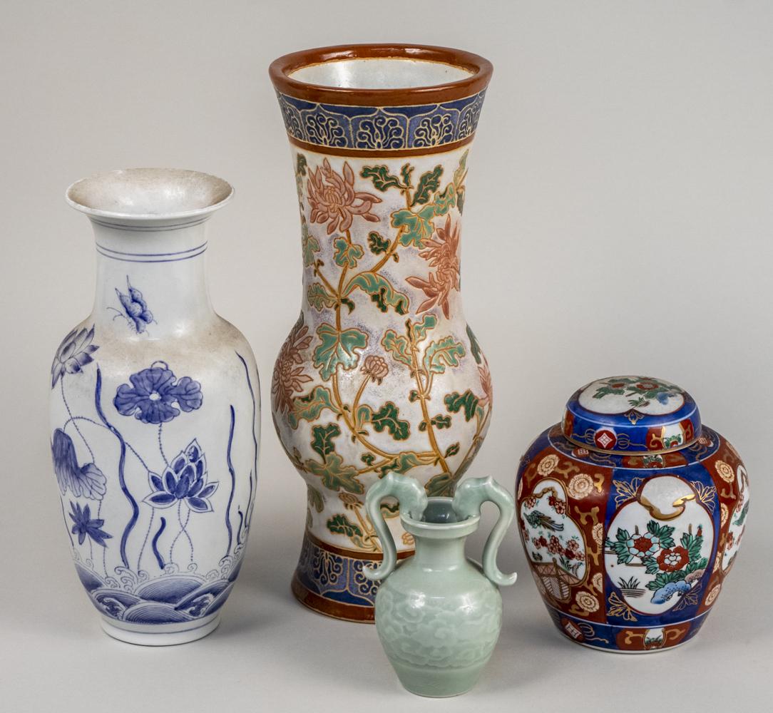 Group of Four Asian Ceramic Table Articles: Comprising a blue and white porcelain vase, a ceramic vase with floral decoration, an imari palette ginger jar, and a small celadon vase. Tallest, height inches. Notice to bidders: Condition reports a