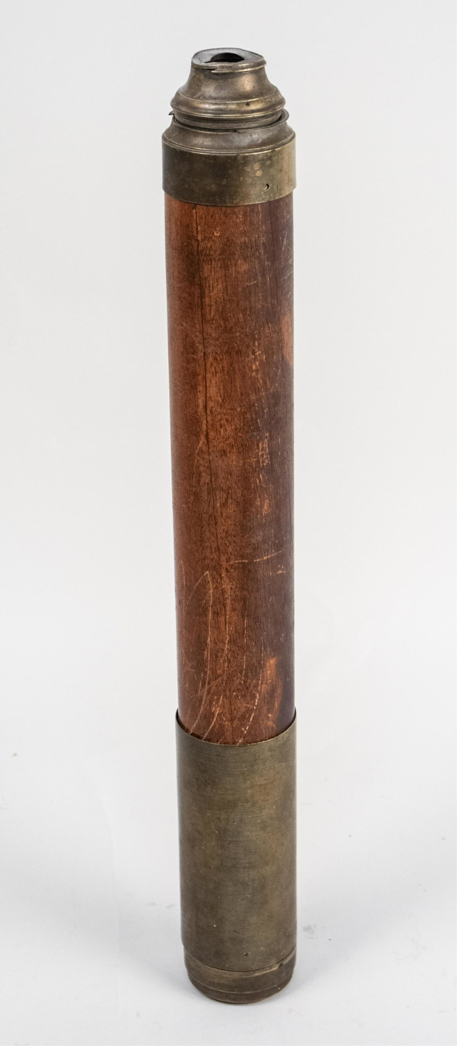 Vintage Telescope: Brass and wood telepsope, for day and night use. Length 20 inches (collasped). Notice to bidders: Due to the nature of this particular online sale, the lots offered may not be available for detailed c