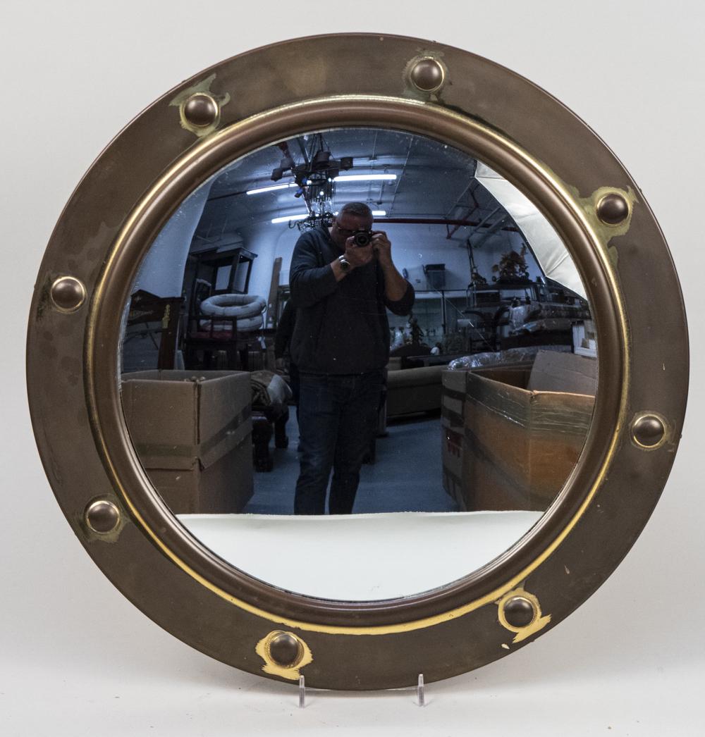 Brass Ships Mirror: Convex mirror plate. Diameter 19 inches. Notice to bidders: Condition reports and additional photographs are provided by request as a courtesy to our clients, as such any condition report is only an o