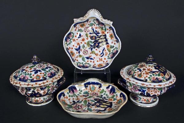 Four English Ironstone Table Articles: In the Imari palette, comprising two sauce tureens and two scalloped dishes. Height of tureens 6 1/2 inches.