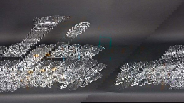 Baccarat Champagne Bucket and Barware: Baccarat metal mounted champagne bucket, Baccarat bottle coaster and group of colorless glass barware, approximately 70 pieces.