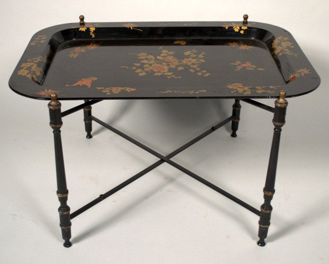 English Regency Style Tray on Stand *: Black lacquered papier mache tray with parcel gilt floral and insect motif, raised on a folding base. Height 30 inches, width 22 inches, depth 18 inches.