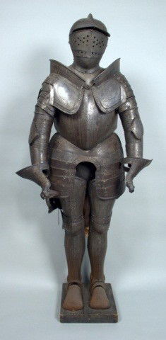 Decorative Suit of Armour: Late 19th/early 20th century, in the sixteenth century style, comprising close helmet, gorget, cuirass, full arm defenses with symmetrical pauldrons, gauntlets, single lame fauld, thigh length tasset,