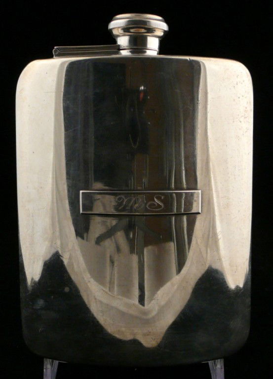 Tiffany Sterling Silver Hip Flask: Two gill hip flask marked Tiffany &Co. 19579-5525 Sterling Silver 925-1000, m. Monogrammed 'MS'. Approximately 9 ounces.