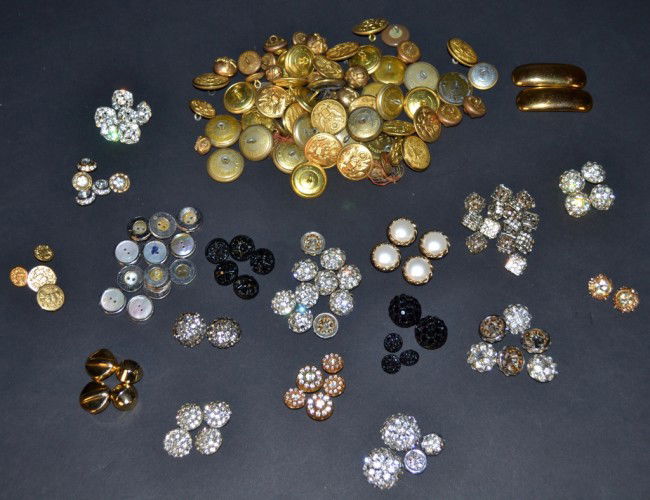 Assorted Group of Buttons: Various styles and materials including rhinestone, gold tone metal, mother of pearl shell, etc.
