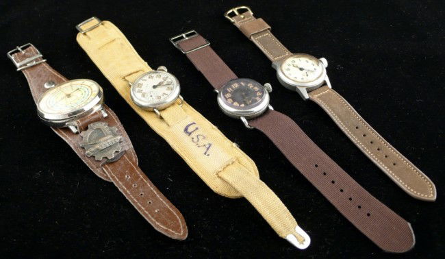 Four Military Watches: Including a German Miles, Bulova and Elgin and one other watch.