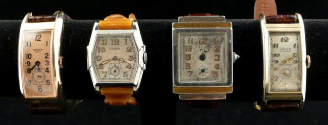 Four Gruen Wristwatches: Two "Drivers" watches, one with crocodile band; and two others, both with subsidiary seconds dials.