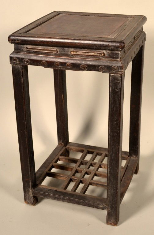 Asian Hardwood Table: Square top on a cloud carved apron, square legs joined by a tic tac toe stretcher. Height 29 1/2 inches, 16 1/2 inches square.
