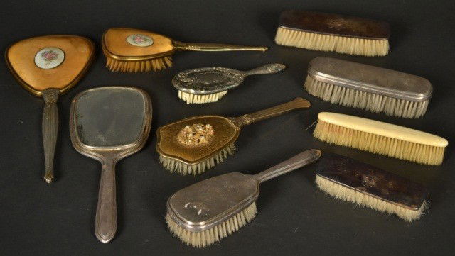 Miscellaneous Group of Silver Dresser Sets: Comprising a Gorham sterling silver three piece set, a Whiting sterling silver two brush set, a floral brush and mirror set, an ivory clothes brush, a gold tone hair brush and a silver plated hair bru