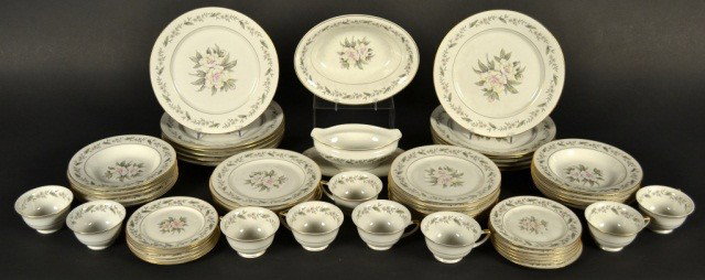 Vogue Ceramics Porcelain Dinner Service: Comprising twelve dinner plates, twelve salad plates, twelve bread plates, nine cups, open vegetable dish, sauce boat.