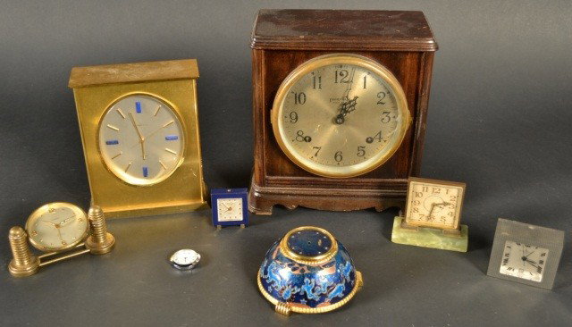 Miscellaneous Group of Clocks: Eight clocks including a Tiffany & Co.desk clock. Height 8 inches.