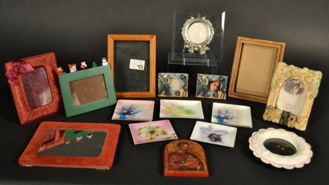 Miscellaneous Group of Picture Frames & Trays: Comprising two wood frames, metal circular frame, fabric frame and five composition frames of various styles and sizes, largest 5 x 7 inches; together with a group of seven enamel decorated metal tray