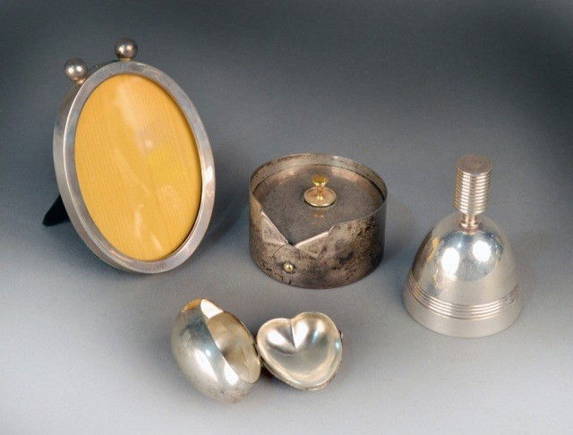 Miscellaneous Group of Silver Decorations: Comprising a Webster Silver Co. sterling oval picture frame, sterling box in the form of a shirt collar, Tiffany heart form box and a Christofle silver plated bell. Total approximately 3 ounces.