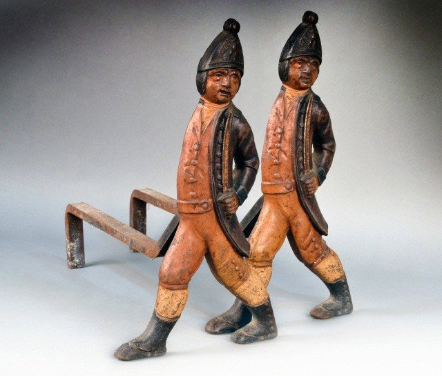 Pair of Figural Andirons: Cast iron figures of Hessian soldiers. Height 20 inches. Note: Removed From The Steinway Mansion