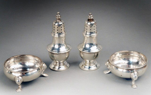 Four Tiffany & Co. Sterling Silver Articles *: Hallmarks for Birmingham, 20th century, comprising a pair of salt cellars and a pair of pepper shakers. Total approximately 5 ounces.
