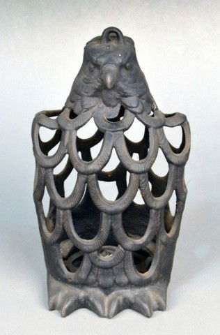 Cast Iron Owl Lantern: Openwork design cast as an owl. Height 10 inches.Note: Removed from the Steinway Mansion