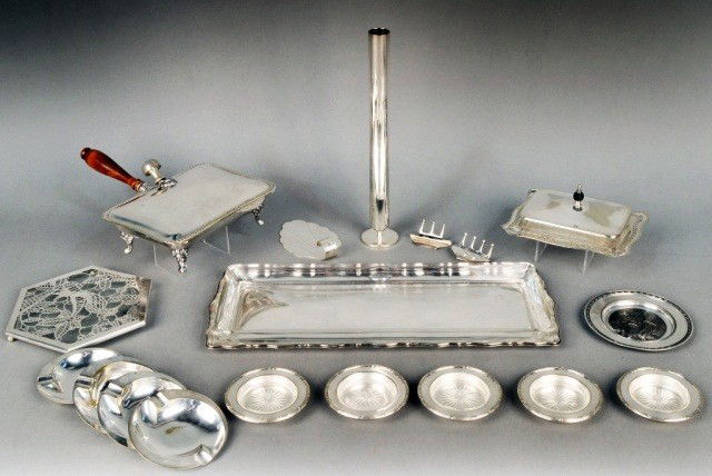 Miscellaneous Group of Silver Plated Articles: Comprising a rectangular tray with glass liner, a vase, butter dish, silent butler, trivet, set of four ashtrays, set of five glass lined dishes, etc.