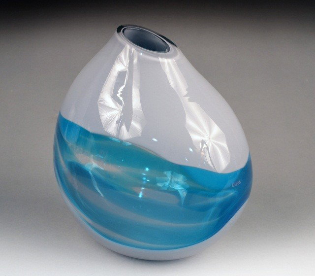 Seguso Vase: Asymmetrical ovoid blue art glass vase, signed on the bottom, "Des L. Seguso" and inscribed "From Venice with Love Lea & Bernie". Height 11 inches.