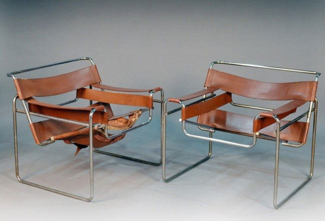 Marcel Breuer (1902-1981) Pair of Wassily Chairs: Leather upholstery, tubular chrome frame. Height 28 inches, width 30 1/2 inches, depth 29 inches.