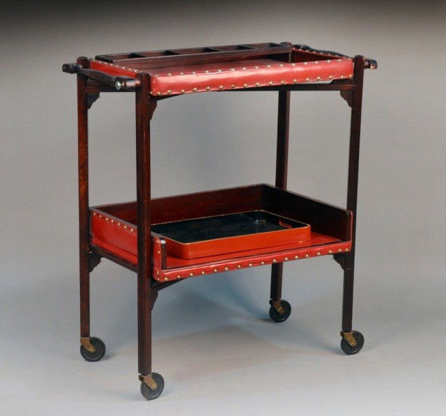Art Deco Bar Cart: Mid century, red leather two tier, tray top, wood framed, rolling cart with brass brads. Height 36 inches, width 32 inches, depth 17 inches.