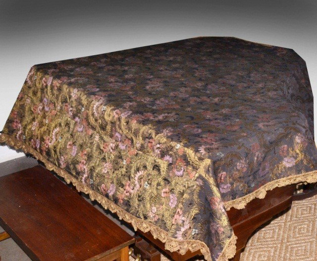 Piano Cover: Floral decoration with metallic lace edge, 6 feet 3 inches.