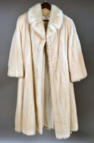 Tourmaline Mink Coat: Male skins, full back, notched collar, straight sleeves, length 48 inches, sweep 80 inches.