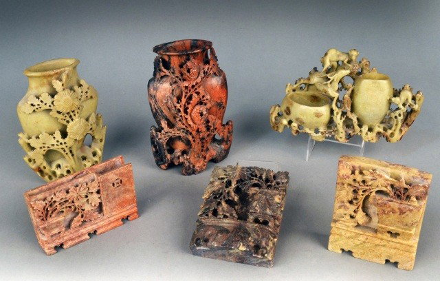 Miscellaneous Group of Soapstone Decorations: Comprising two vases, a double vase, a pair of bookends, etc. Tallest 7 1/2 inches.