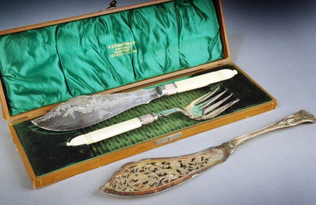 English Fish Serving Set & One Fish Slice: John Dixon & Sons silver plated set in original fitted box, together with another pierced fish slice, length 13 inches.