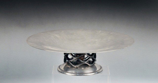 Christofle Silver Plated Tazza: Circa 1930, designed by Luc Lanel, circular with concave center, open wave pedestal base. Diameter 13 3/4 inches.