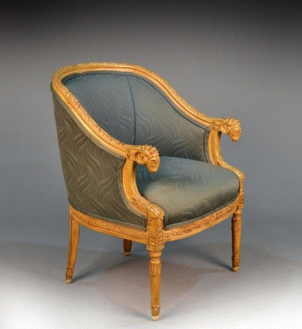 Louis XVI Style Painted Bergere: Carved ram's head armrests. Height 33 inches, widh 26 inches, depth 28 inches.