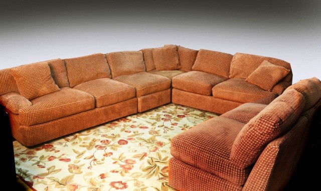 Large Over Upholstered Sectional Sofa: By Beacon Hill, with rust colored upholstery. Height 36 inches.