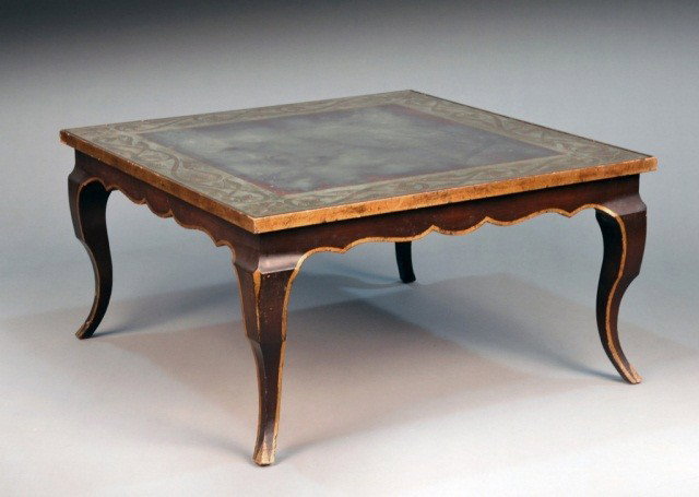 Ebonized and Mirrored Low Table: Mid 20th century. Ebonized with eglomise mirrored top. Height 17 inches, width 32 inches, depth 32 inches.
