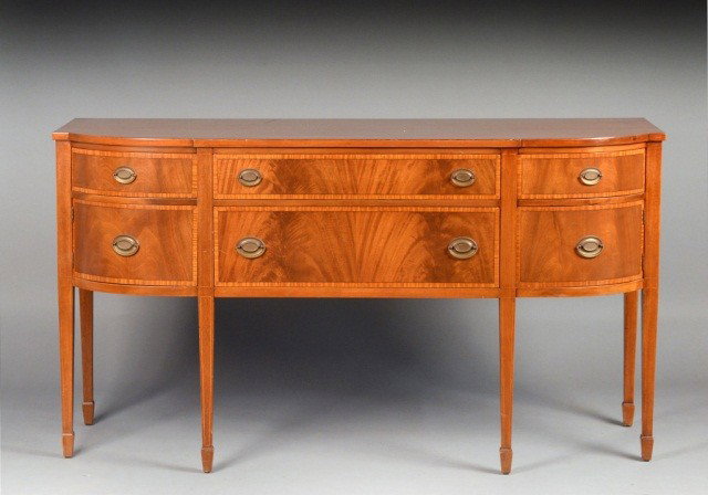 Hepplewhite Style Mahogany Sideboard: 20th century reproduction. Height 37 1/2 inches, width 68 inches, depth 23 inches.