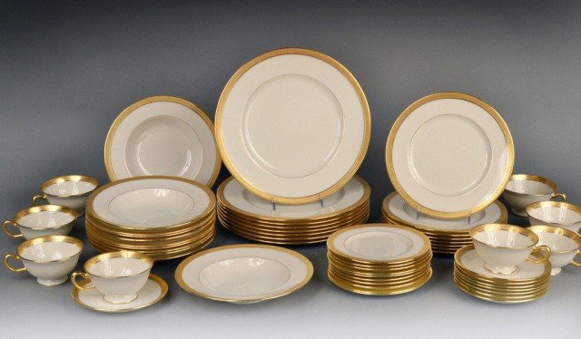 Lenox Porcelain Dinner Service: Lowell pattern, full service for eight, comprising eight dinner plates, eight salad plates, eleven soup plates, ten bread plates, eight cups and eight saucers. Dinner plate diameter 10 1/2 inches.