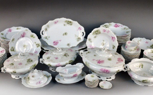German Porcelain Dinner Service: Comprising twelve dinner plates, eleven salad plates, ten fruit bowls, soup tureen, eleven soup plates, butter dish, ten butter pats, three graduated platters, sauce boat, two covered vegetable dishes
