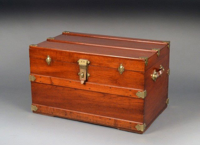 Mahogany Foot Locker: Turn of the century with brass cleats and leather carrying straps. Height 22 inches, width 36 1/2 inches, depth 22 inches.