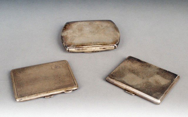 Three English Silver Cigarette Cases: One, London and two Birmingham, all early 20th century. Total approximately 8.5 ounces.