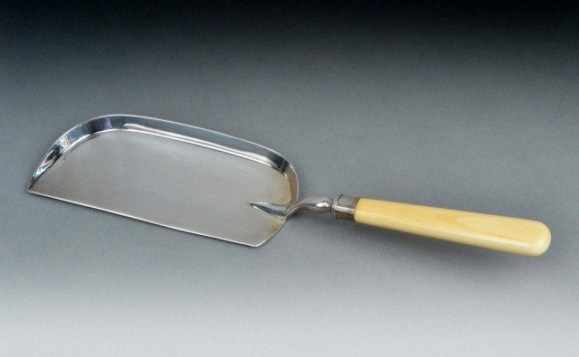English Silver & Ivory Crumber: Robert Pringle & Sons, Sheffield, 1925. Length 12 3/4 inches.