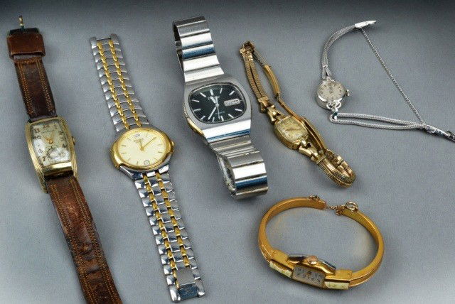 Group of Six Wristwatches: Bulova quartz, Hamilton gold filled watch, Pulsar quartz, Omega 14k white gold watch, Hamilton 14k yellow gold watch and a Fleurly's bracelet watch.