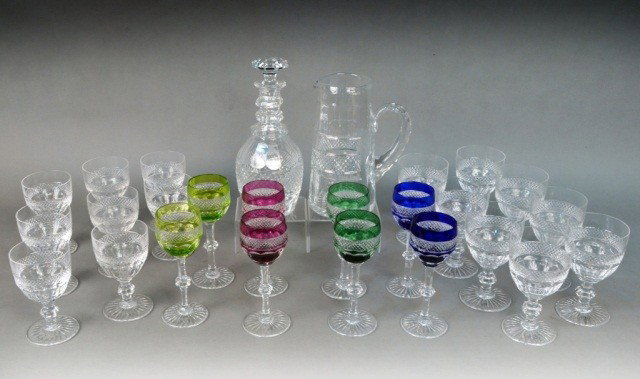 Miscellaneous Group of St. Louis Glassware: Trianon pattern, comprising sixteen colorless glass goblets in two sizes, eight colored and clear glass goblets, a ringed neck bottle form decanter and a tapered cocktail pitcher.