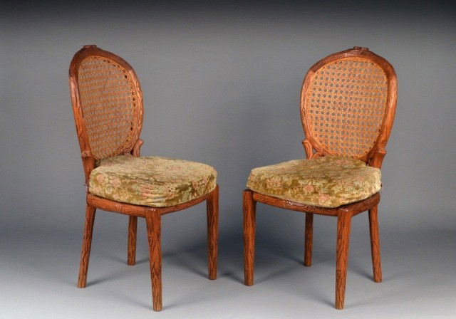 Set of Six Dining Chairs: Each with oval caned back and a tapestry upholstered seat cushion. Height 40 inches, width 20 inches, depth 22 inches.