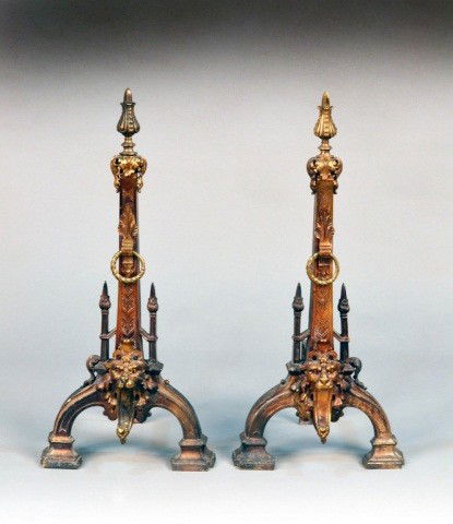 Pair of Andirons: Tapered square column with acanthus leaf and mask decoration. Height 27 1/2 inches.