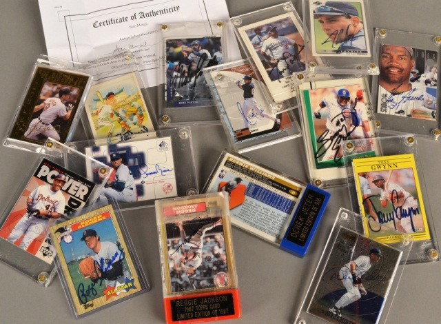 Assorted Group of Autographed Baseball Cards: Including Ricky Ledee, Mike Piazza, Tom Lasodora, Sammy Sosa, Tony Gwynn, Stan Musial , Reggie Jackson, and Roger Clemens all include certificates of authenticity; Cal Ripken Jr., Bernie Williams, Der