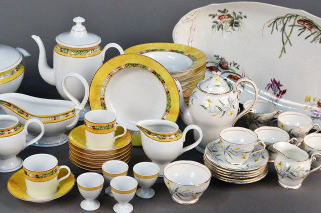 Two Porcelain Table Services: One, a Limoges porcelain dinner service, Terre de Sienne, decorated by Coguet; and the other, an English bone china coffee service; together with a Limoges porcelain fish platter.