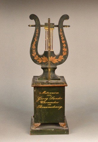 Tole Lyre Form Metronome: 19th century, signed Metronom von Gerog Sander Uhrmacher in Braunschweig. Height 16 inches.