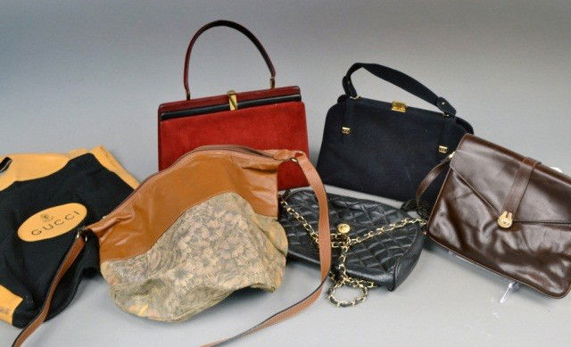 Group of Designer Handbags: Comprising various designers including two Ferragamo purses, Gucci bag, Dunhill, Lerucci and Saks Fifth Avenue